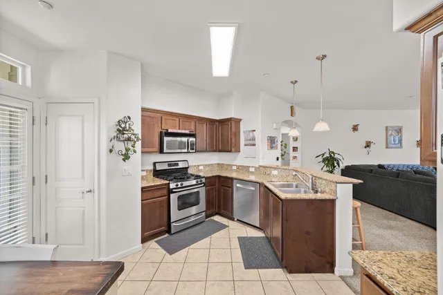an aerial view of a house with outdoor space