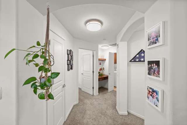 an aerial view of a houses with yard