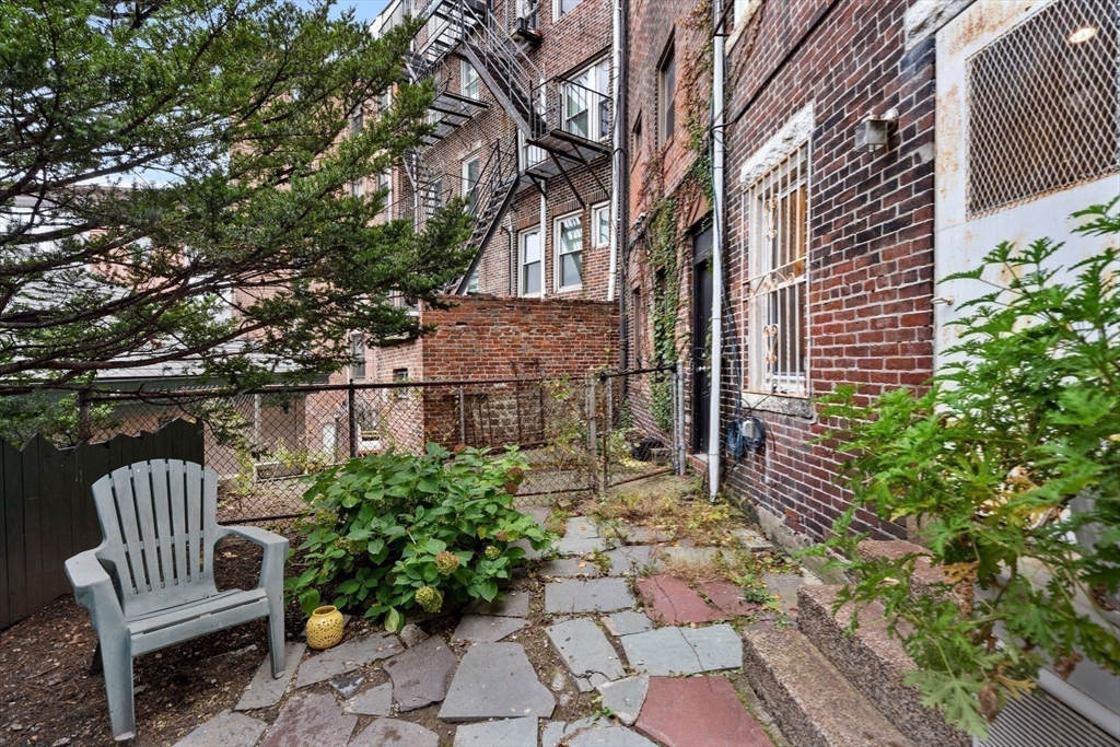 6 North Hudson Street, Unit 1 Boston, MA 02113 - Photo 19 of 22 a view of a chairs in the patio