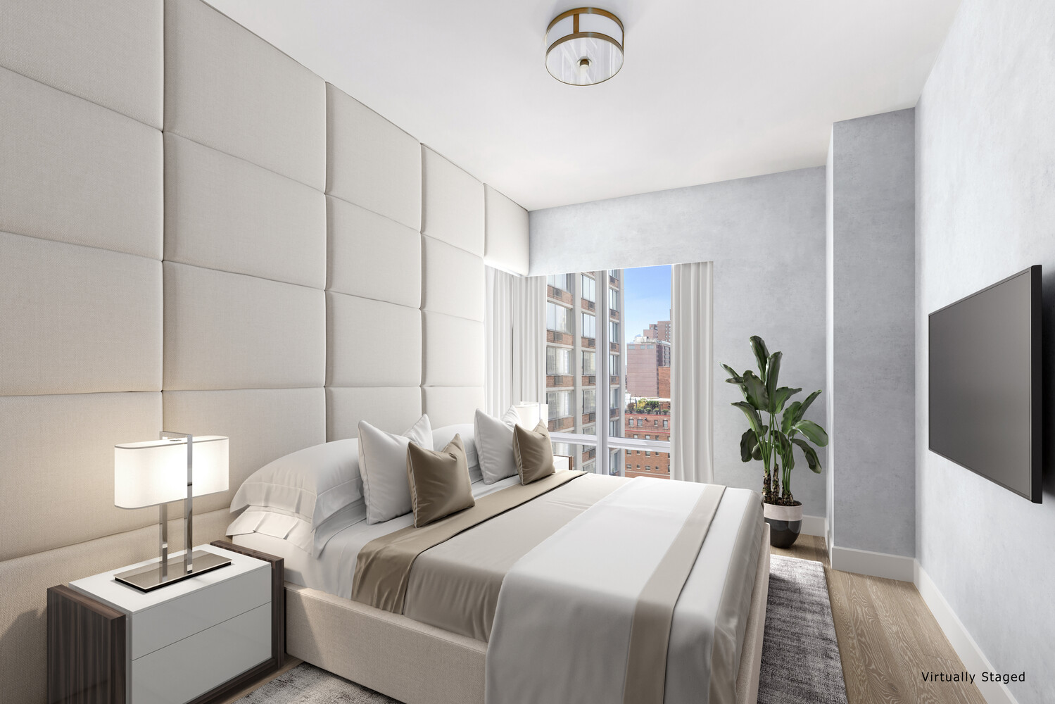 1355 1st Avenue, Unit 22 Manhattan, NY 10021 - Photo 11 of 16 a bedroom with a bed and a potted plant