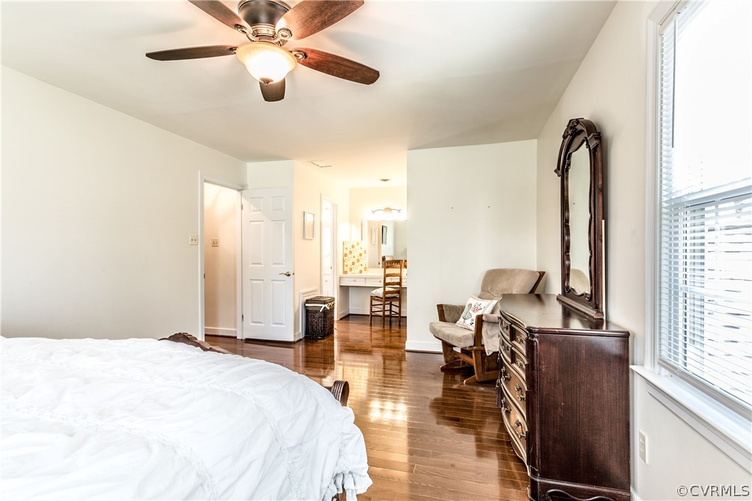 13625 Queensgate Road Midlothian, VA 23114 - Photo 17 of 35 a bedroom with a bed and wooden floor