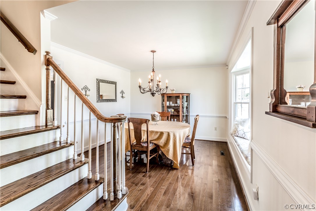13625 Queensgate Road Midlothian, VA 23114 - Photo 2 of 35 a view of a dining room with furniture window and wooden floor