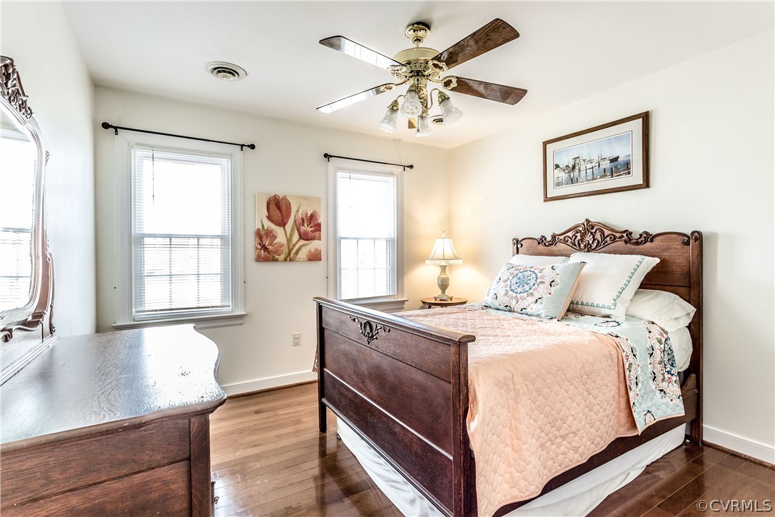 13625 Queensgate Road Midlothian, VA 23114 - Photo 21 of 35 a bedroom with a bed and a large window