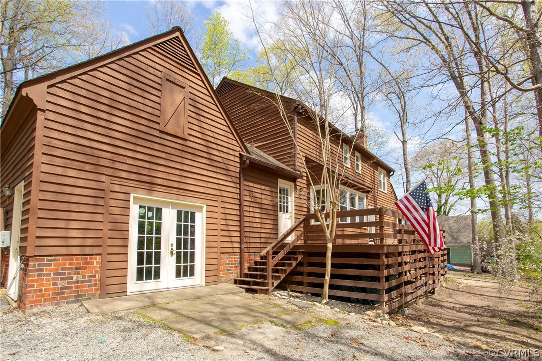 13625 Queensgate Road Midlothian, VA 23114 - Photo 27 of 35 a front view of a house with a stairs