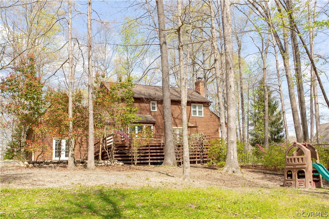 13625 Queensgate Road Midlothian, VA 23114 - Photo 28 of 35 front view of a building with a yard