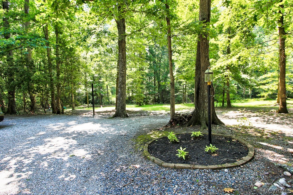 13625 Queensgate Road Midlothian, VA 23114 - Photo 30 of 35 a view of a backyard with large trees