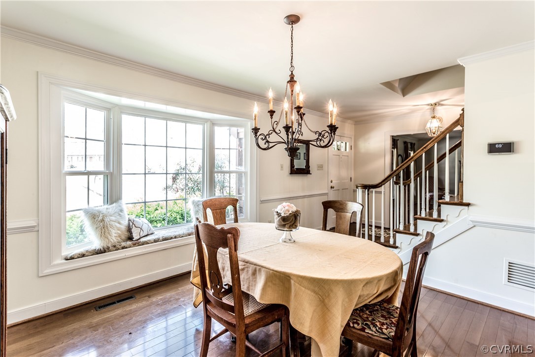 13625 Queensgate Road Midlothian, VA 23114 - Photo 3 of 35 a view of a dining room with furniture window and wooden floor
