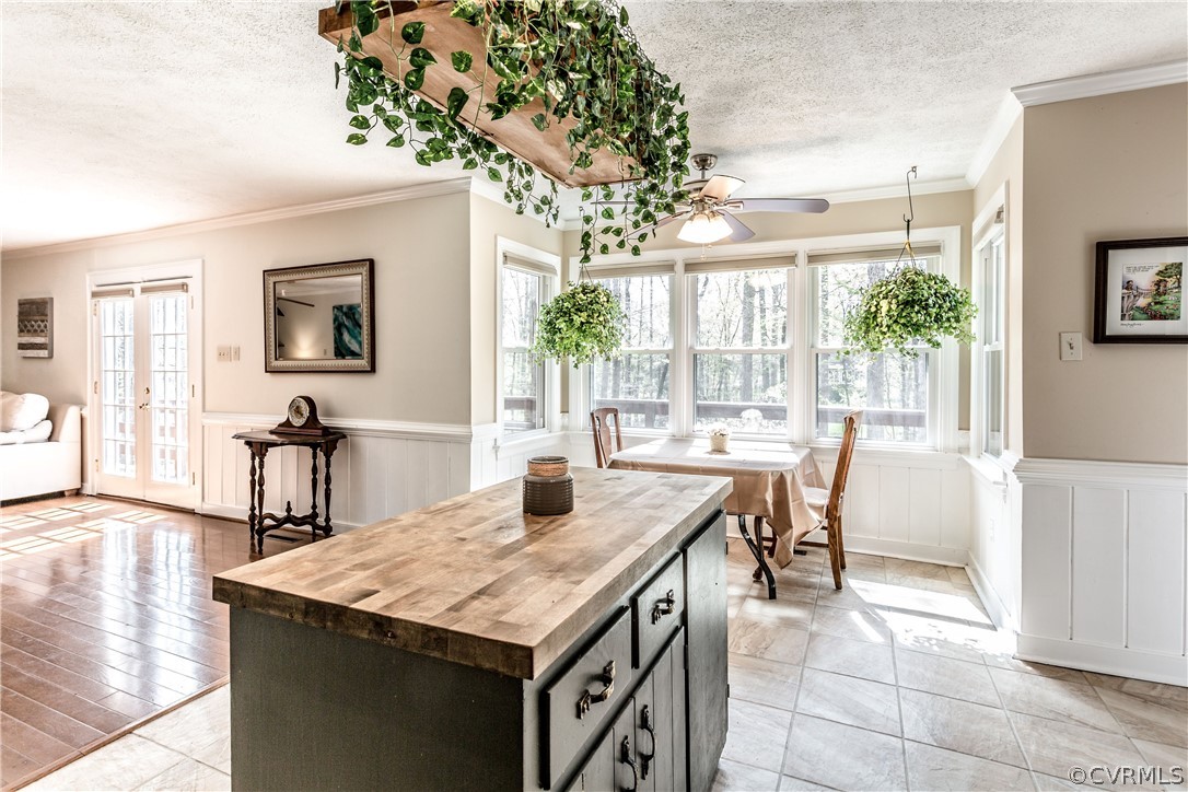 13625 Queensgate Road Midlothian, VA 23114 - Photo 6 of 35 a view of a dining room with furniture and a potted plant