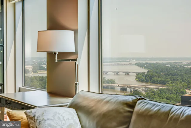 a bedroom with furniture and a window