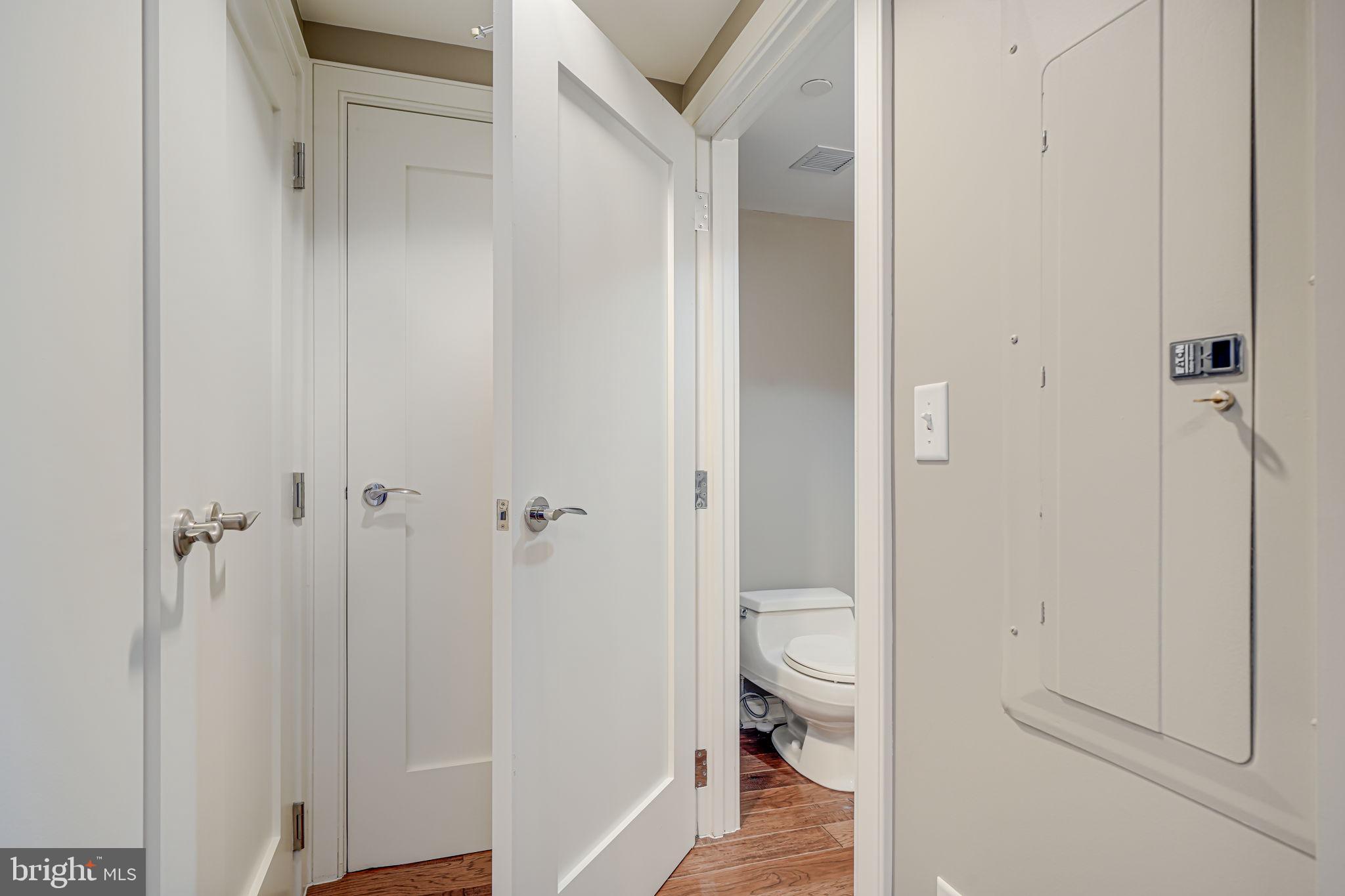 1111 19th Street North, Unit 2703 Arlington, VA 22209 - Photo 24 of 52 Entryway Powder Room