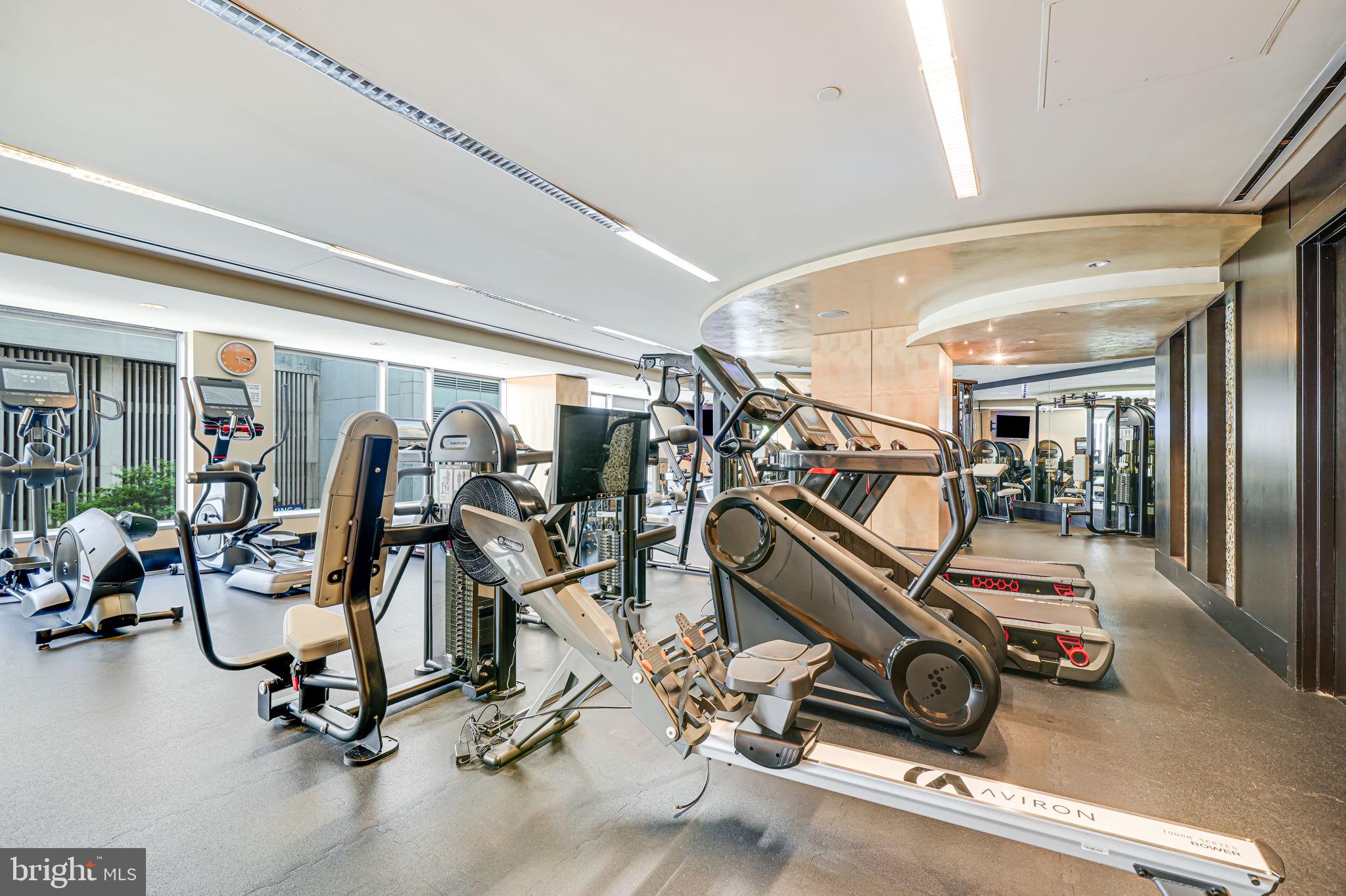 1111 19th Street North, Unit 2703 Arlington, VA 22209 - Photo 50 of 52 a view of a room with gym equipment
