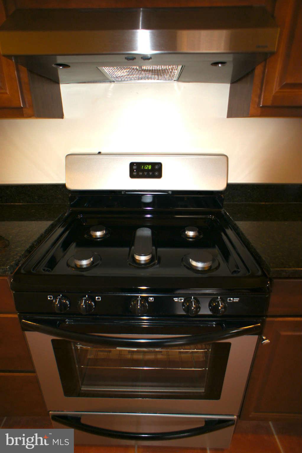 6939 Decatur Street Hyattsville, MD 20784 - Photo 8 of 29 Enjoy GAS Cooking on your new Gas Stove.
