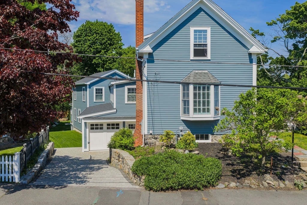 27 Maverick Street Marblehead, MA 01945 - Photo 29 of 31 a front view of a house with plants and trees