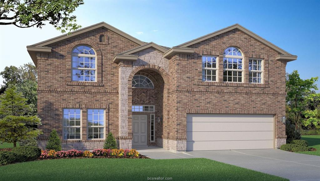 2038 Rock Rdg Avenue Bryan, TX 77807 - Photo 1 of 3 a front view of a house with a yard and garage