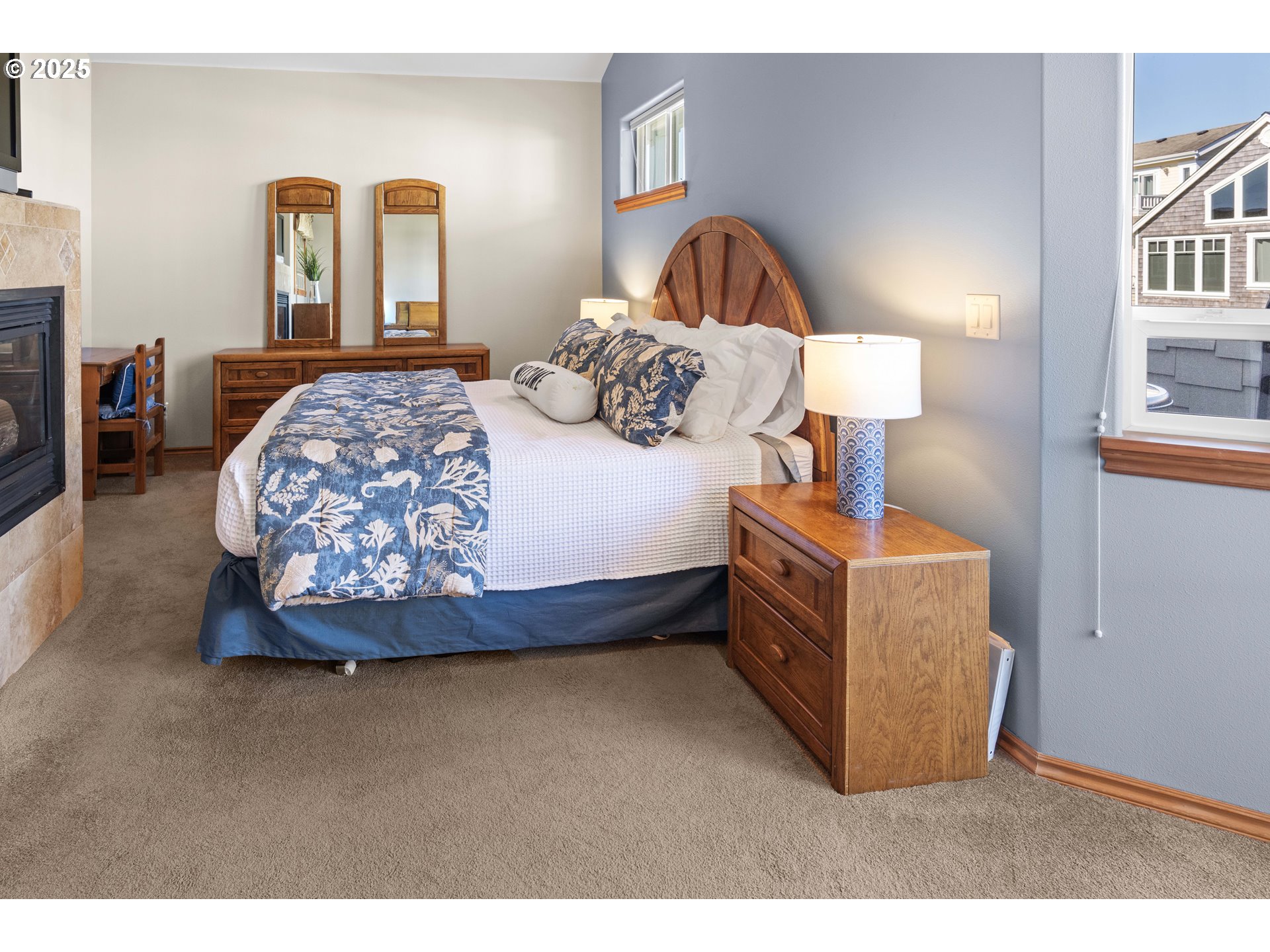 260 Round House Road Astoria, OR 97103 - Photo 23 of 37 a bedroom with a bed and a dresser