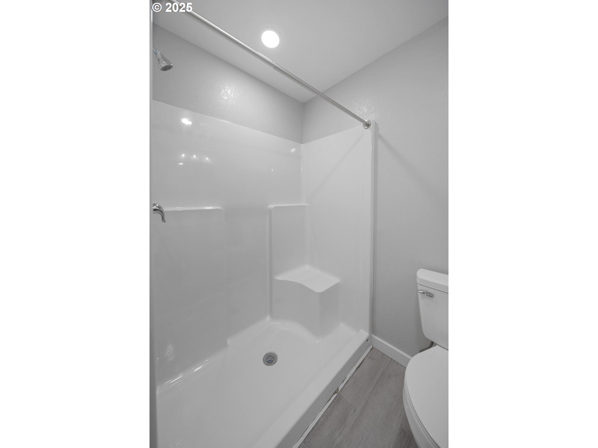680-682 Elm Avenue Reedsport, OR 97467 - Photo 30 of 36 a bathroom with a shower and a toilet