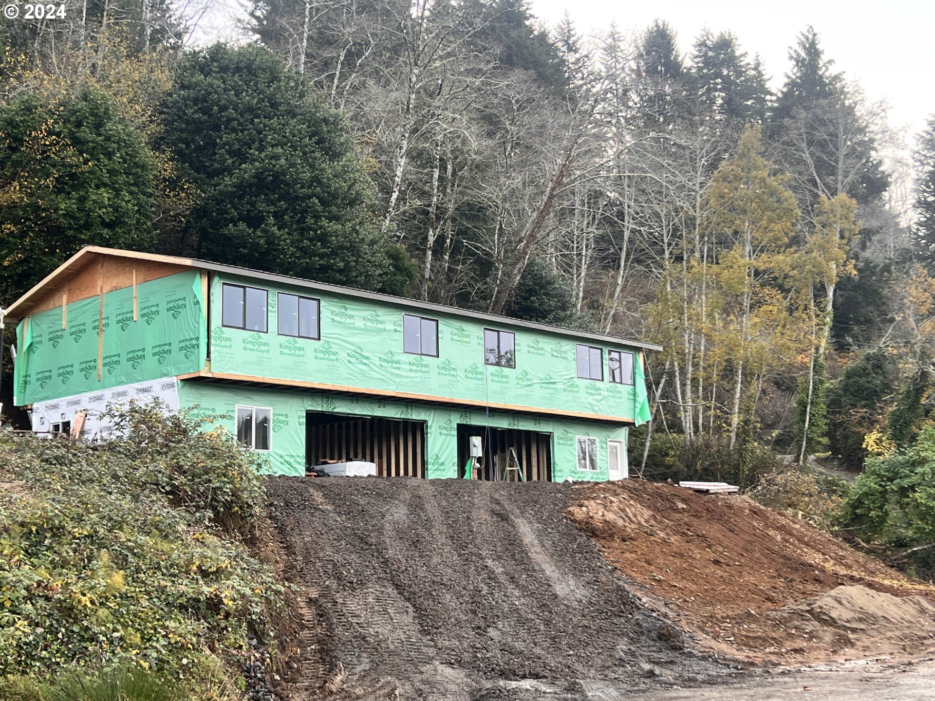 680-682 Elm Avenue Reedsport, OR 97467 - Photo 3 of 36 a view of a house with a yard balcony