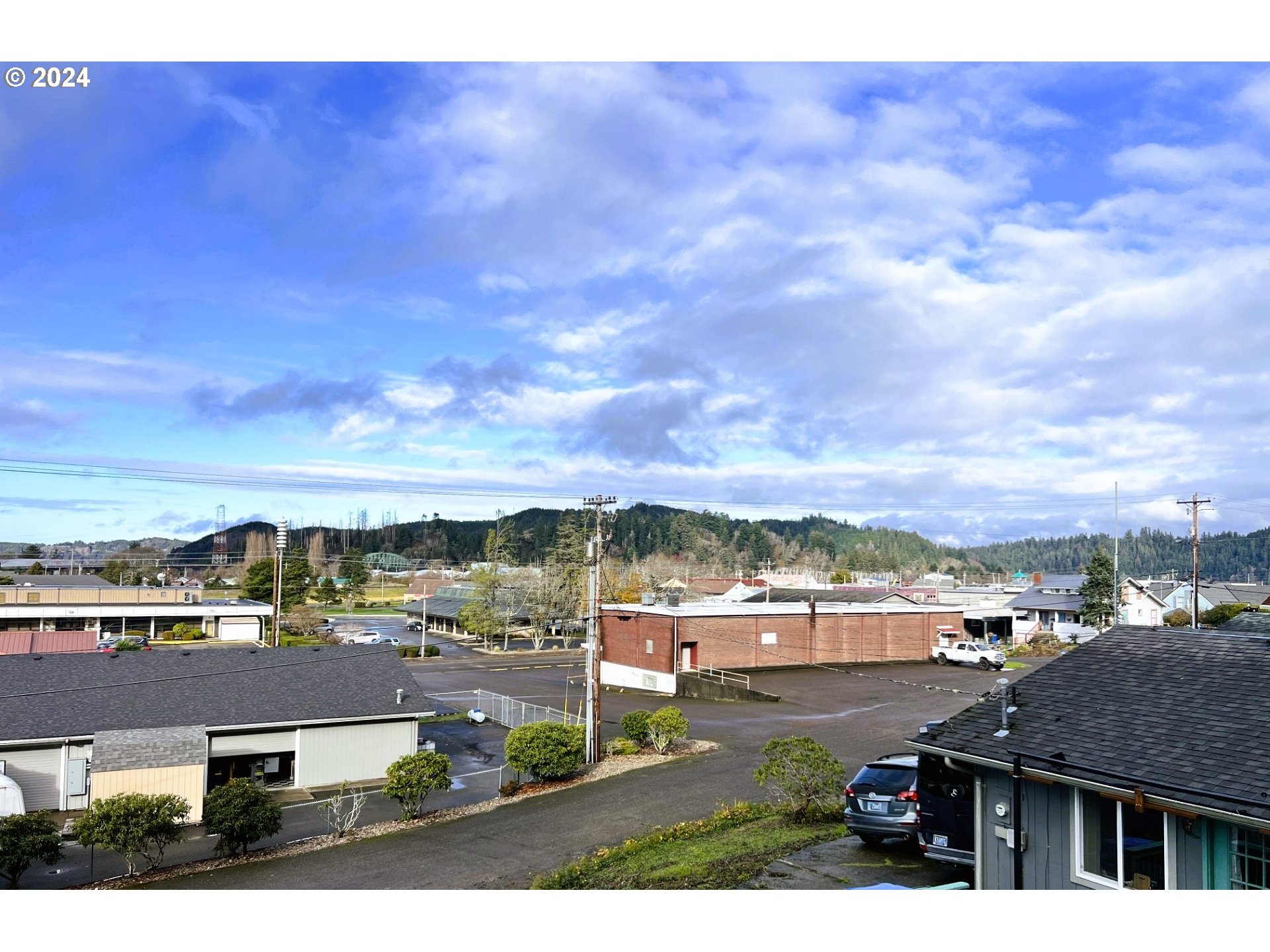 680-682 Elm Avenue Reedsport, OR 97467 - Photo 6 of 36 a view of residential houses with city view