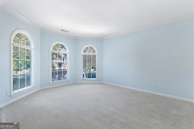 an empty room with windows