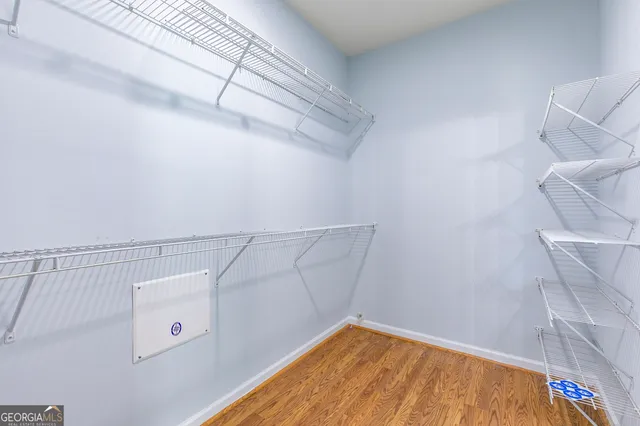 a view of a room with racks on the wall