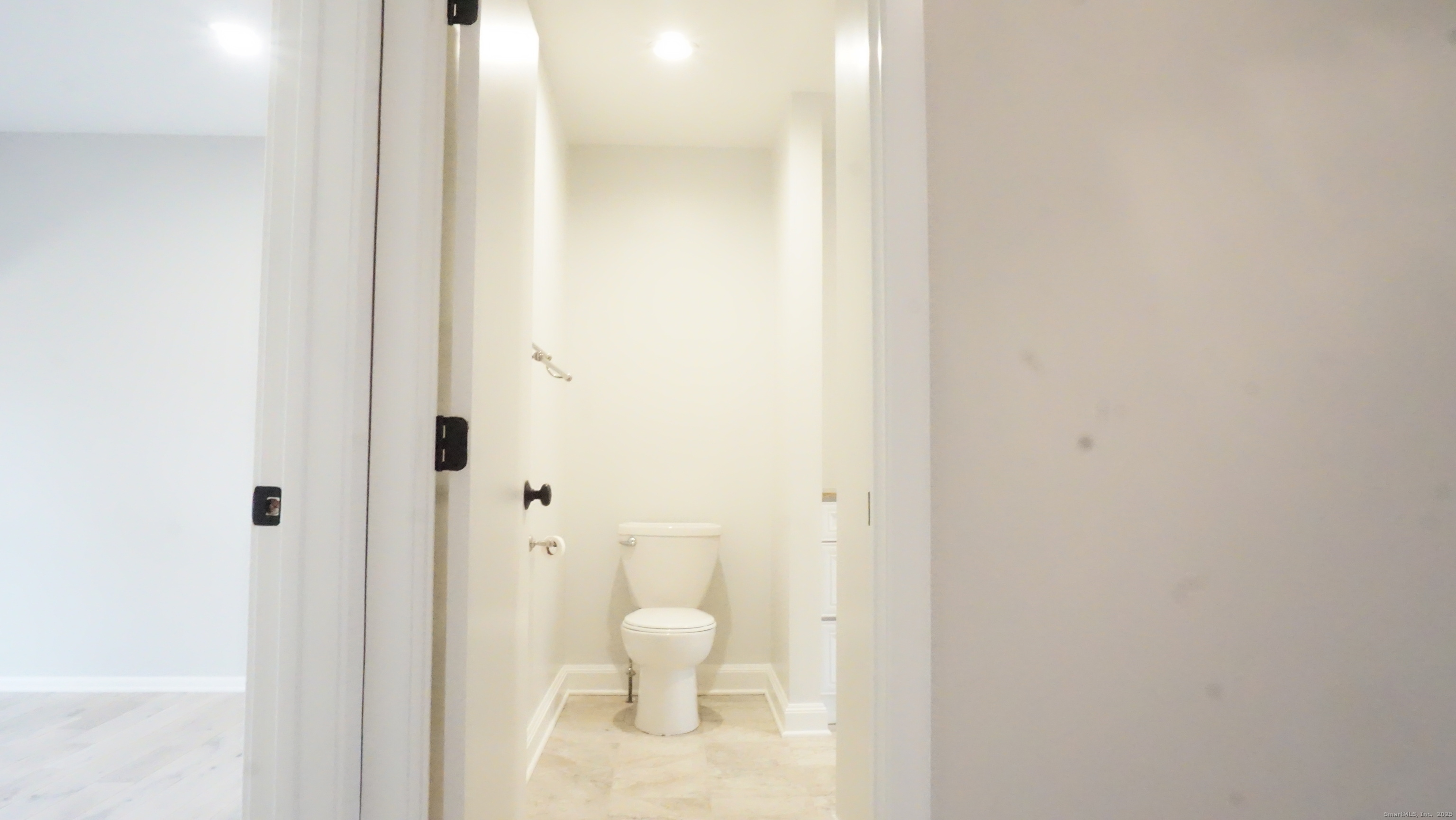 24 Overlook Drive, Unit 24 Monroe, CT 06468 - Photo 19 of 32 a bathroom with a toilet