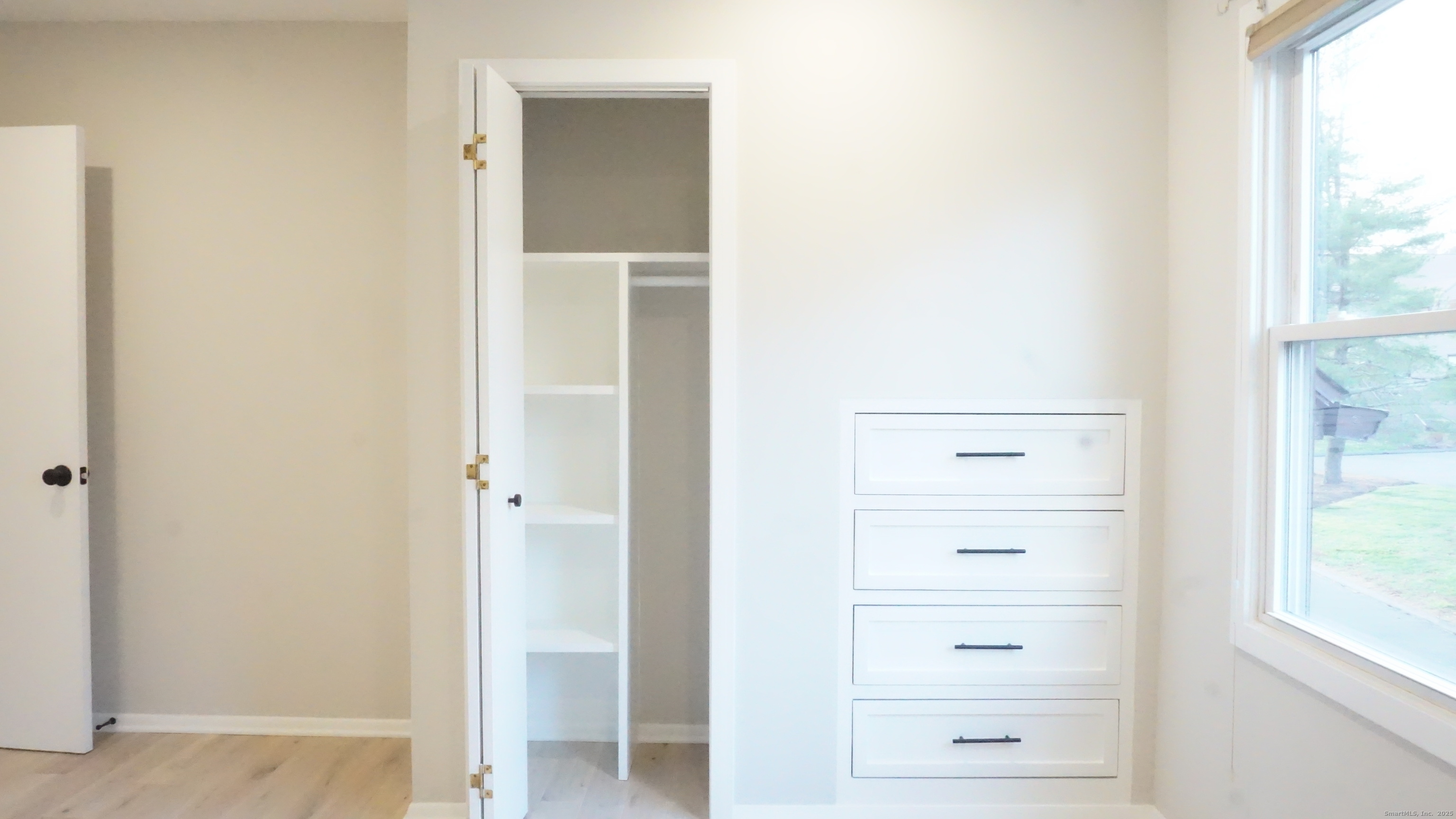 24 Overlook Drive, Unit 24 Monroe, CT 06468 - Photo 21 of 32 a view of walk in closet with window