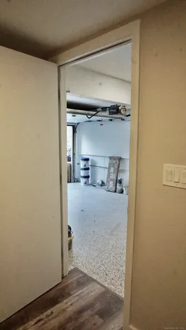 a front view of a house with plants