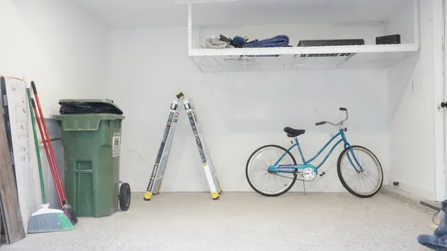 a view of a field with trees in the background