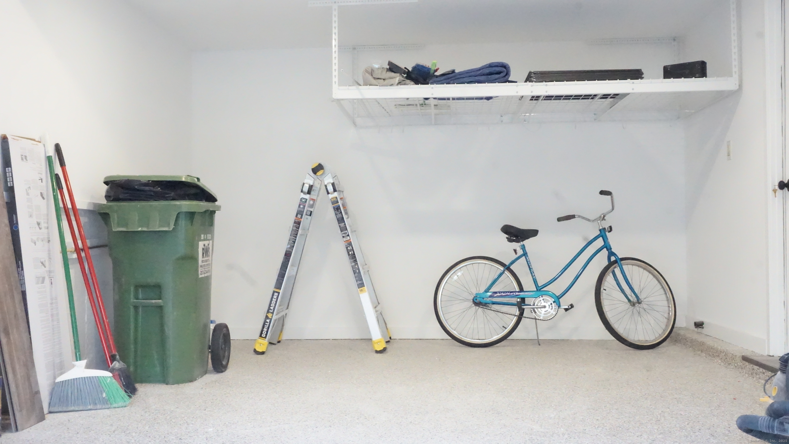 24 Overlook Drive, Unit 24 Monroe, CT 06468 - Photo 29 of 32 a view of small space with racks on the wall