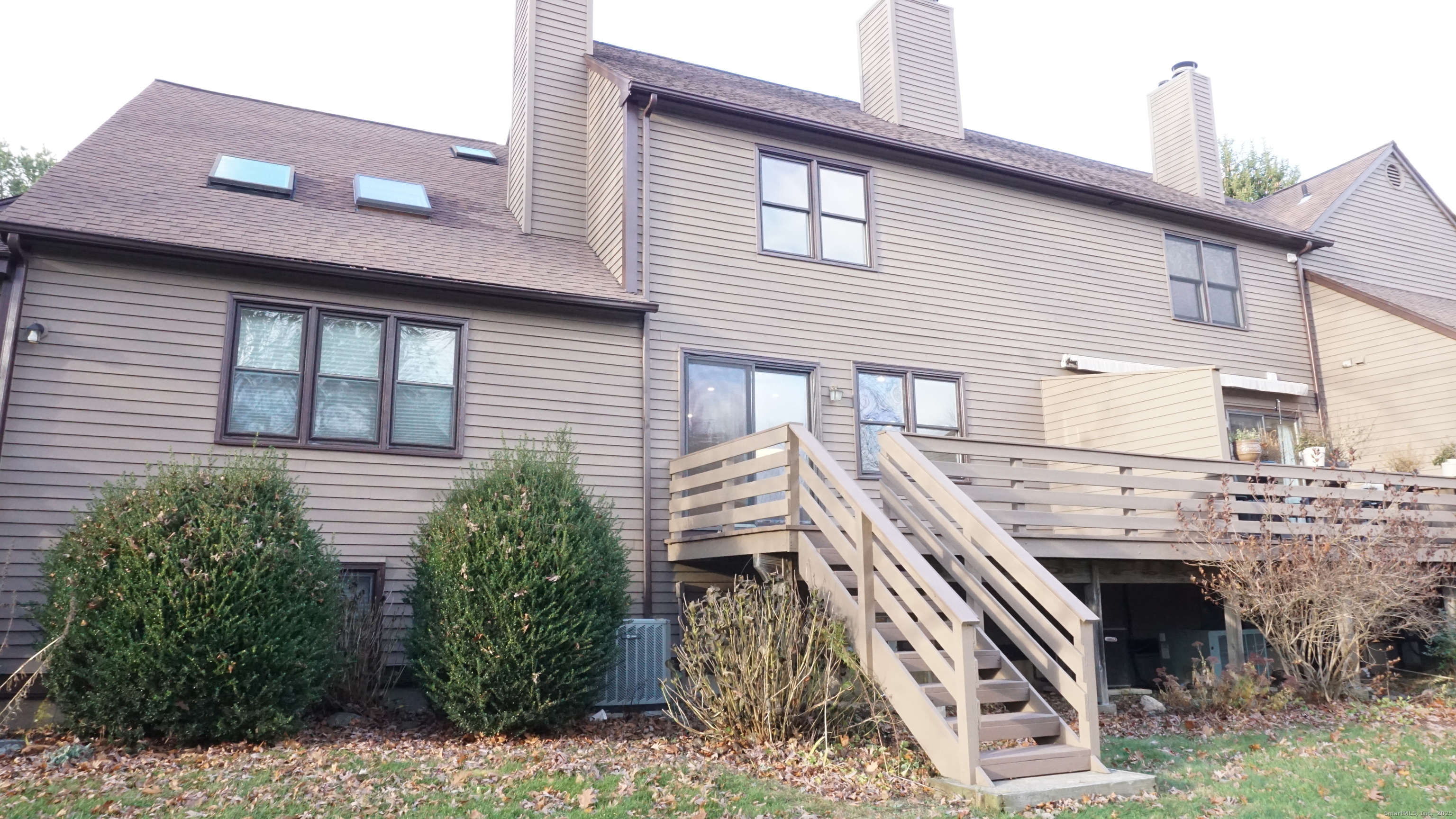 24 Overlook Drive, Unit 24 Monroe, CT 06468 - Photo 30 of 32 a front view of a house with plants