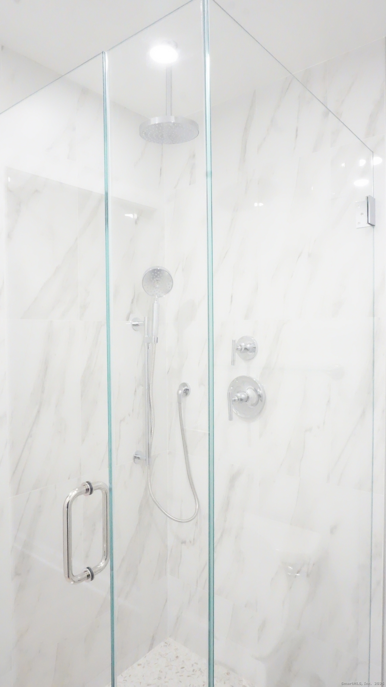 24 Overlook Drive, Unit 24 Monroe, CT 06468 - Photo 9 of 32 a bathroom with a shower