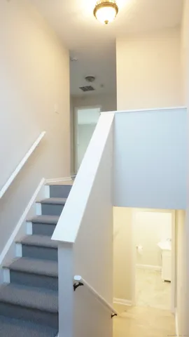 a picture of a bathroom with a shower and a mirror