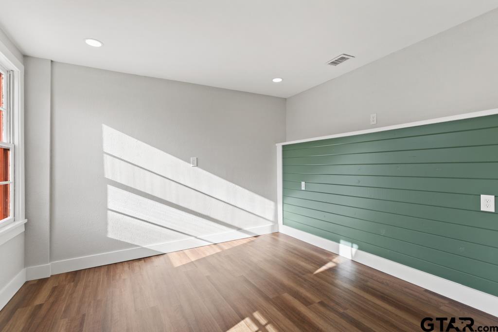 2819 New Copeland Road Tyler, TX 75701 - Photo 16 of 39 a view of empty room with wooden floor