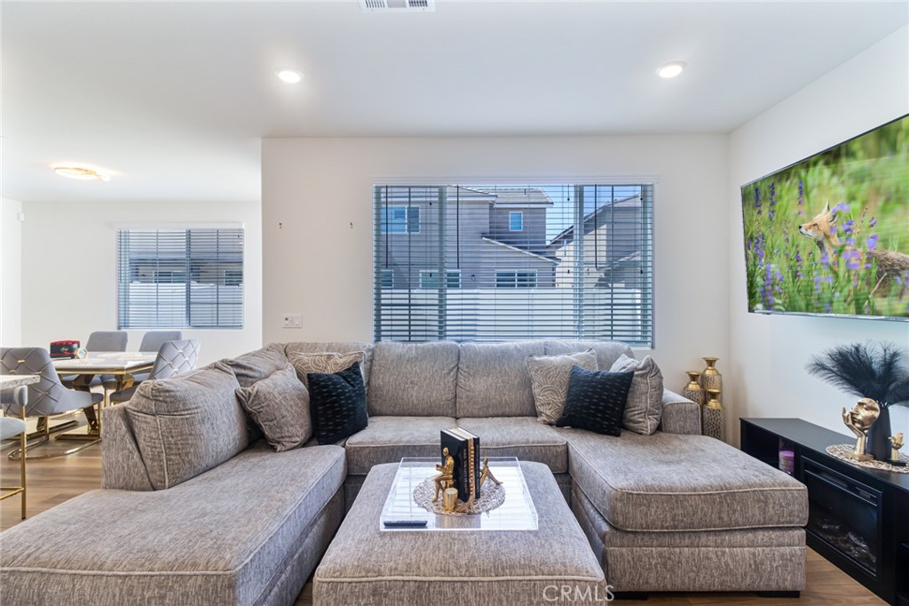 2448 Powell Drive Rialto, CA 92377 - Photo 2 of 30 a living room with furniture and a large window