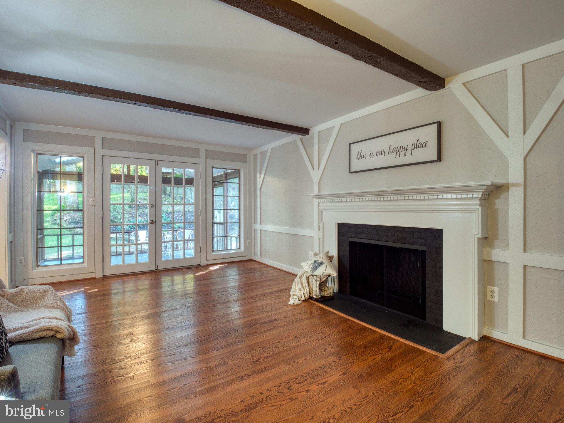 9705 Rhapsody Drive Vienna, VA 22181 - Photo 4 of 28 COZY FIREPLACE IN FAMILY ROOM