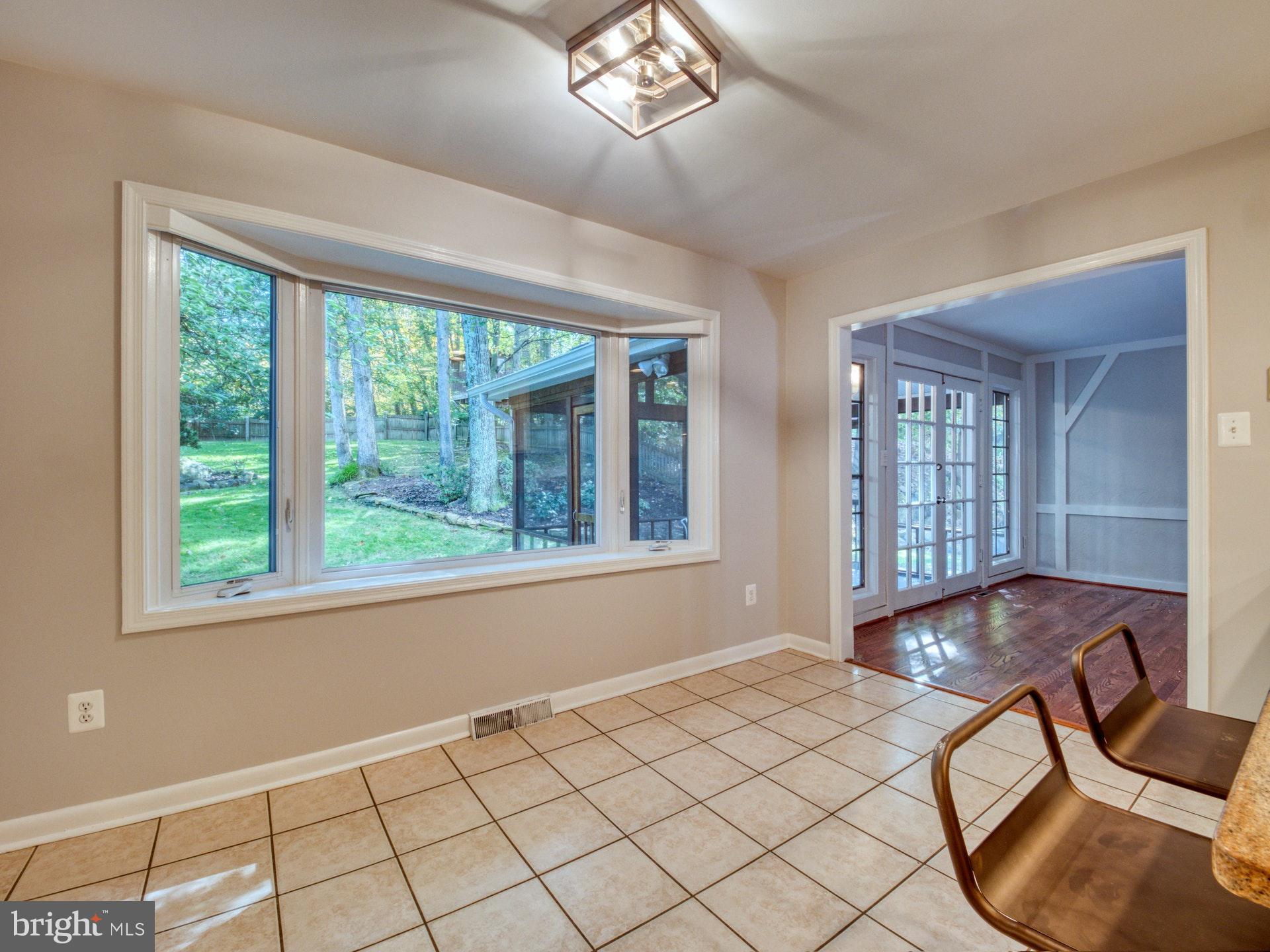 9705 Rhapsody Drive Vienna, VA 22181 - Photo 7 of 28 ANOTHER BAY WINDOW TO BACKYARD