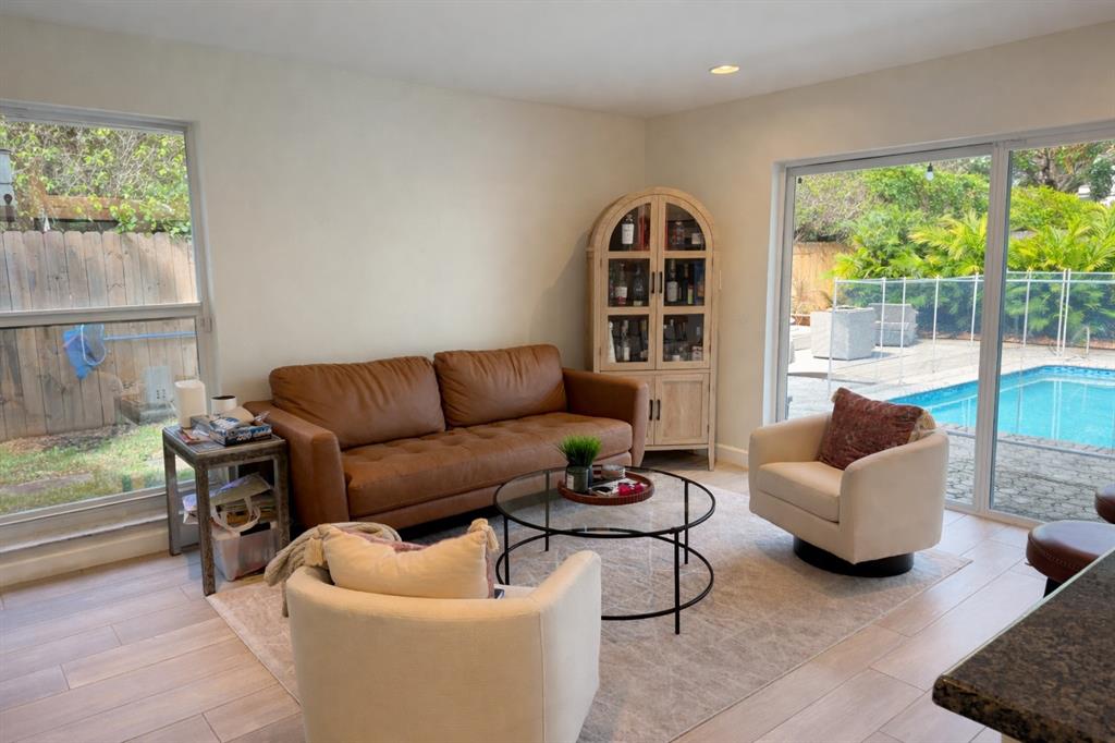 126 Laurel Road Hollywood, FL 33021 - Photo 4 of 16 a living room with furniture and a window
