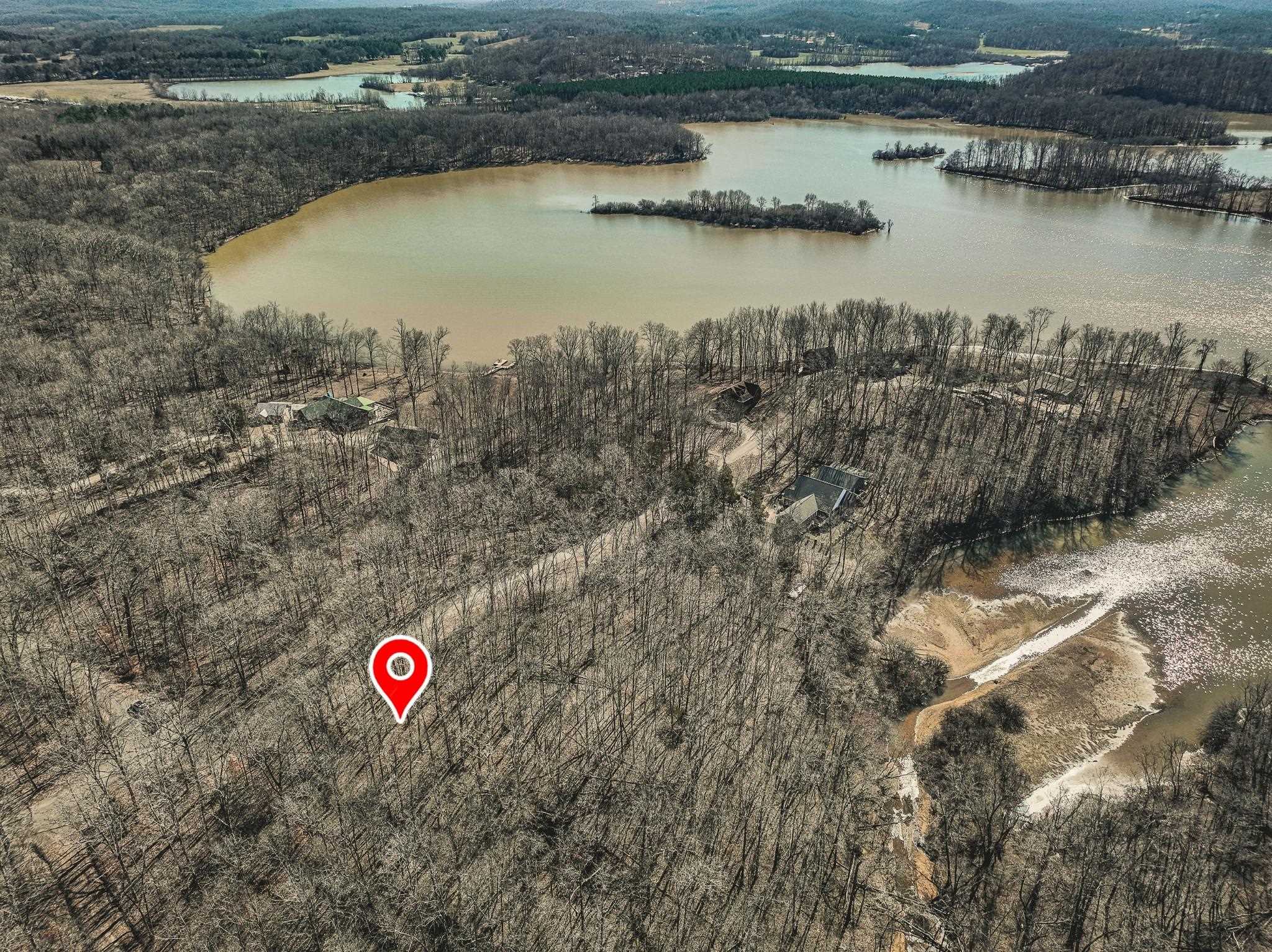 Lot 0425 Fawn Ridge Road Parsons, TN 38363 - Photo 1 of 21 a view of a houses with a lake view