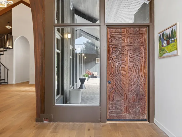 a view of a door and a window