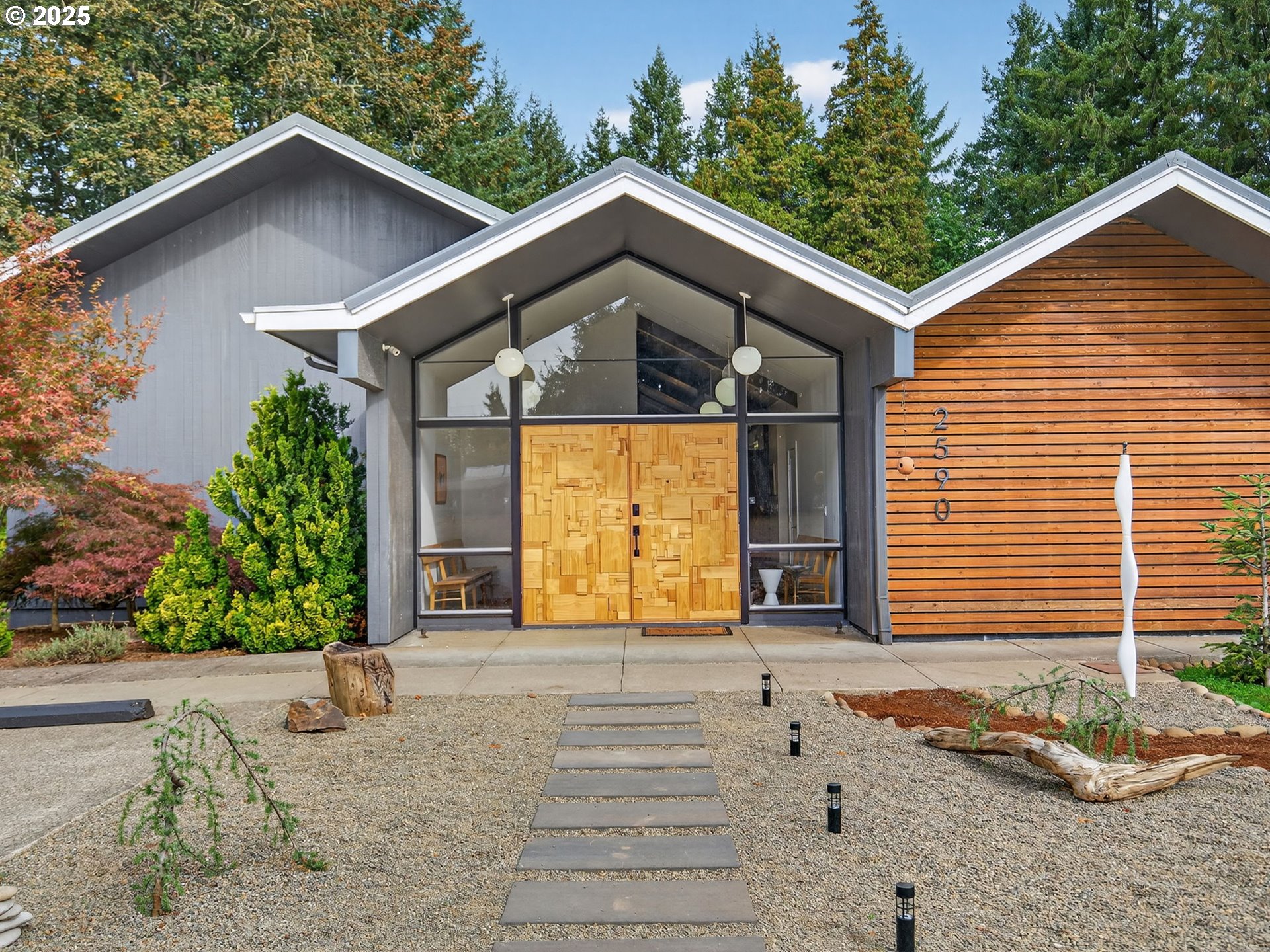 2590 Long Street Sweet Home, OR 97386 - Photo 2 of 48 a front view of a house with a yard