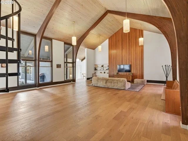 a view of livingroom with furniture and floor to ceiling window