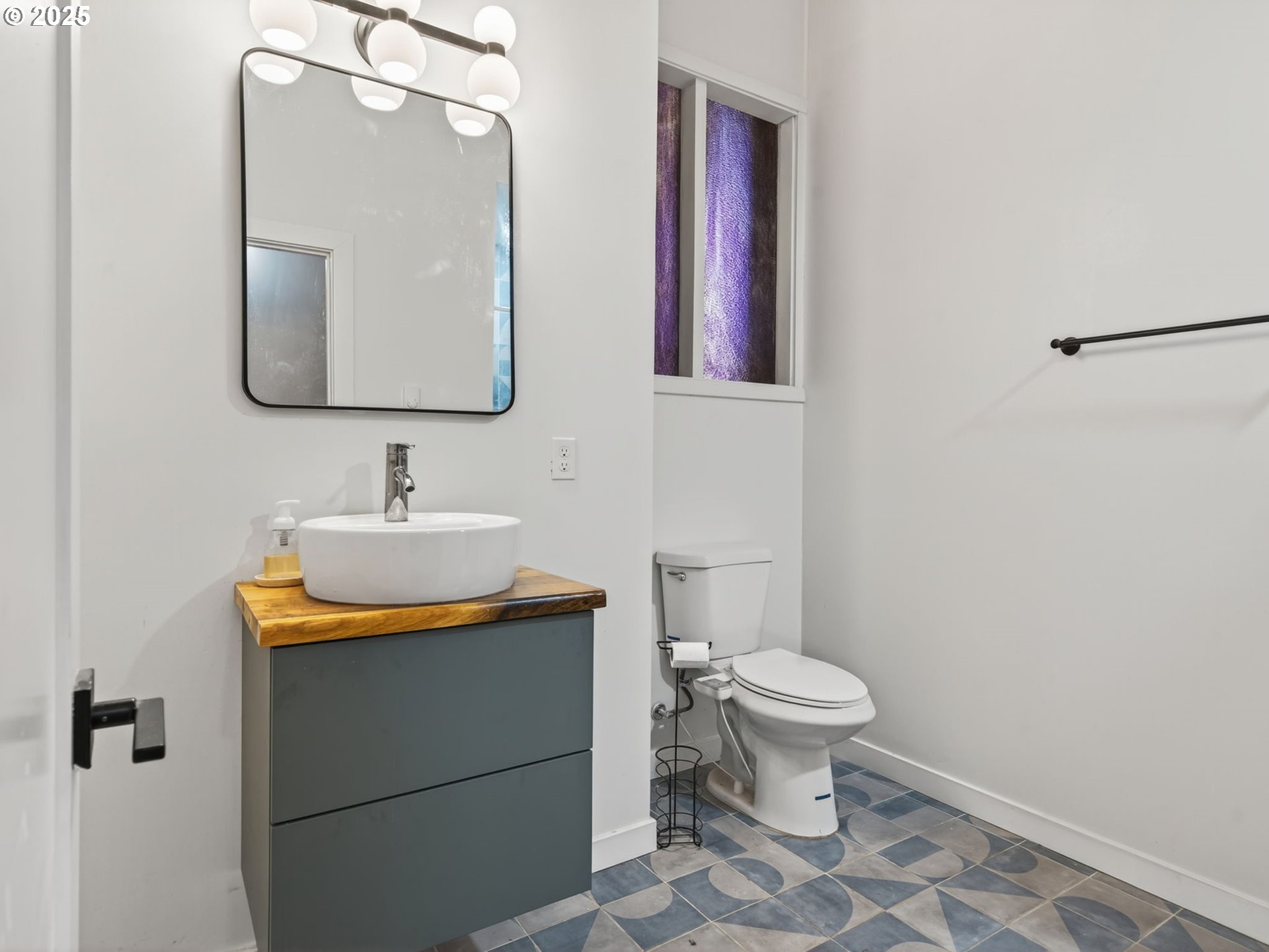 2590 Long Street Sweet Home, OR 97386 - Photo 26 of 48 a bathroom with a toilet sink and mirror