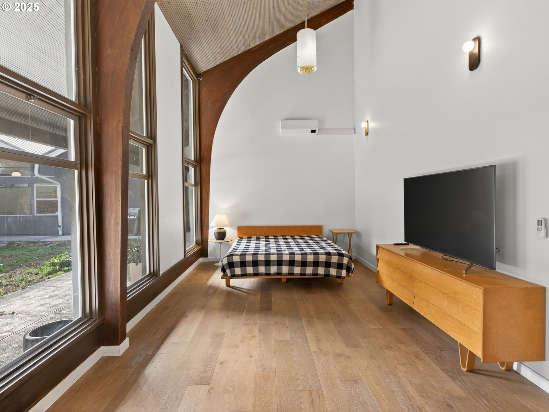 2590 Long Street Sweet Home, OR 97386 - Photo 28 of 48 a living room with a bed and a flat screen tv