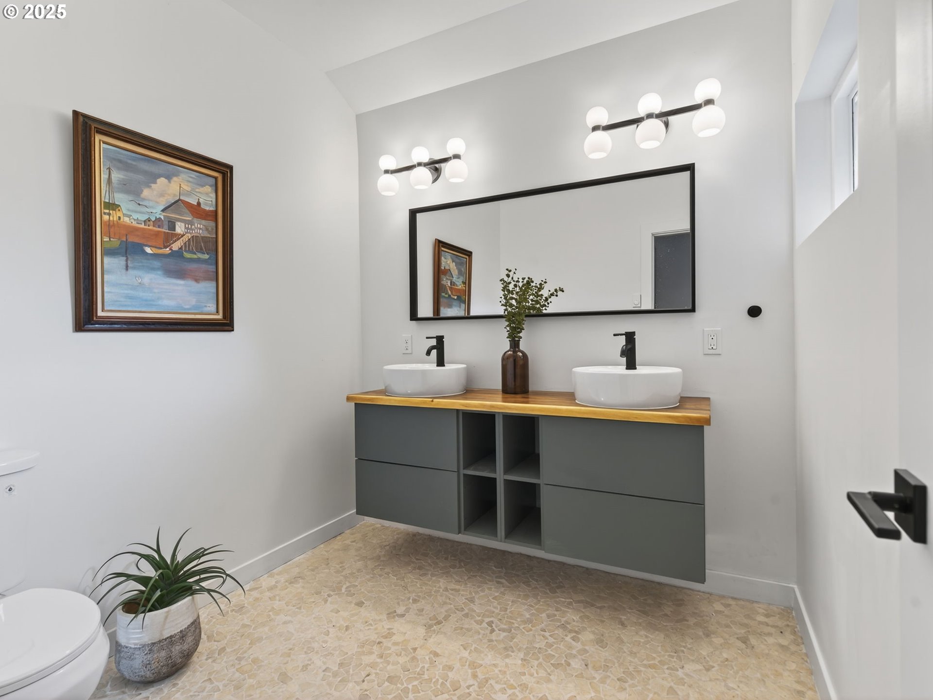 2590 Long Street Sweet Home, OR 97386 - Photo 32 of 48 a bathroom with a sink a mirror and a potted plant