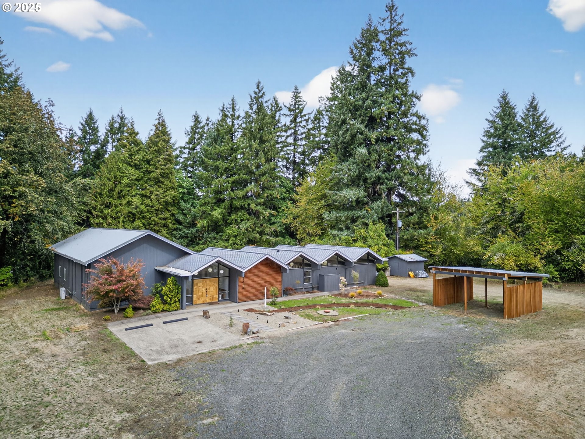 2590 Long Street Sweet Home, OR 97386 - Photo 4 of 48 a view of house with yard and a garden