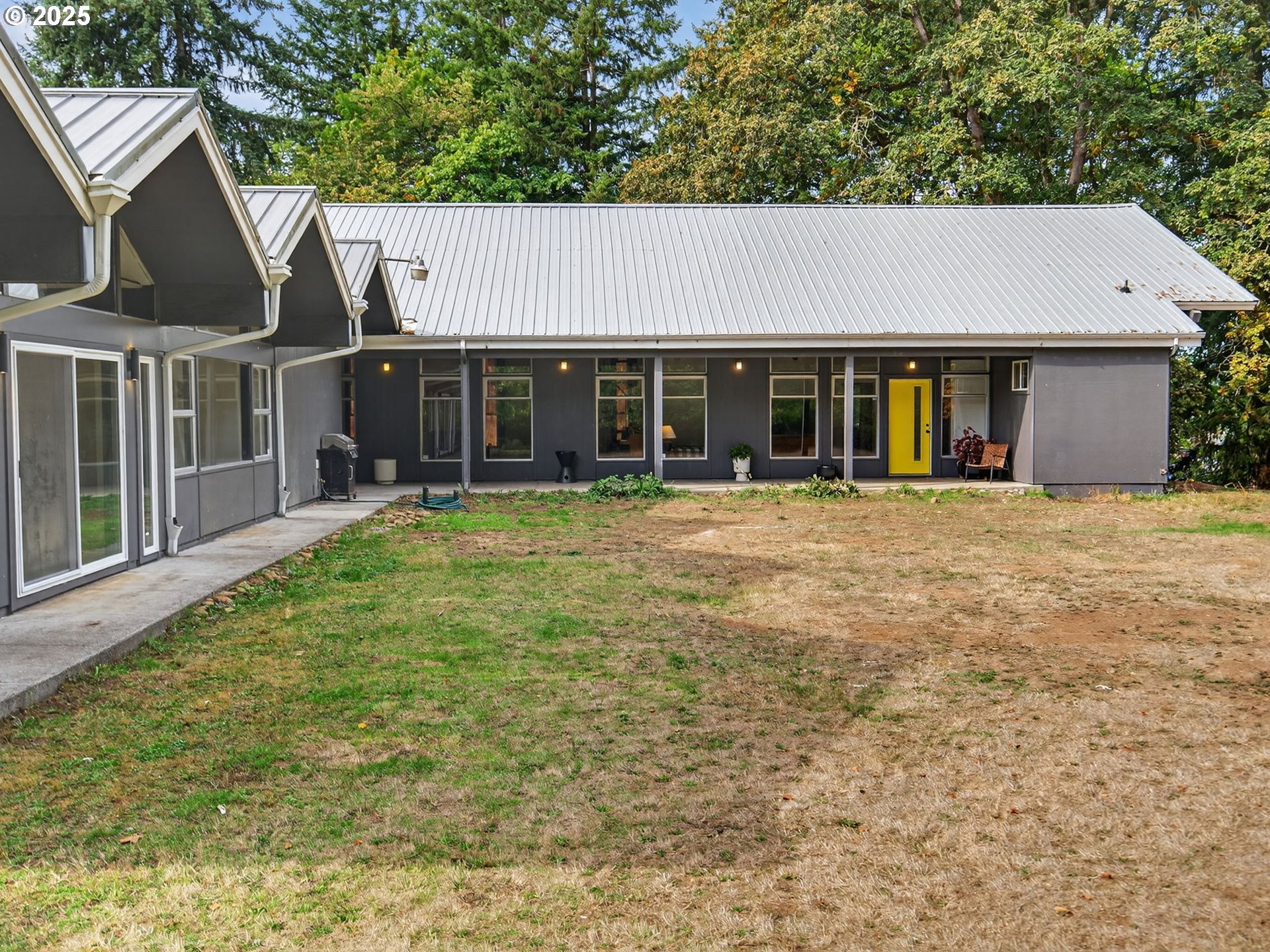 2590 Long Street Sweet Home, OR 97386 - Photo 6 of 48 a view of a house with garden and sitting area