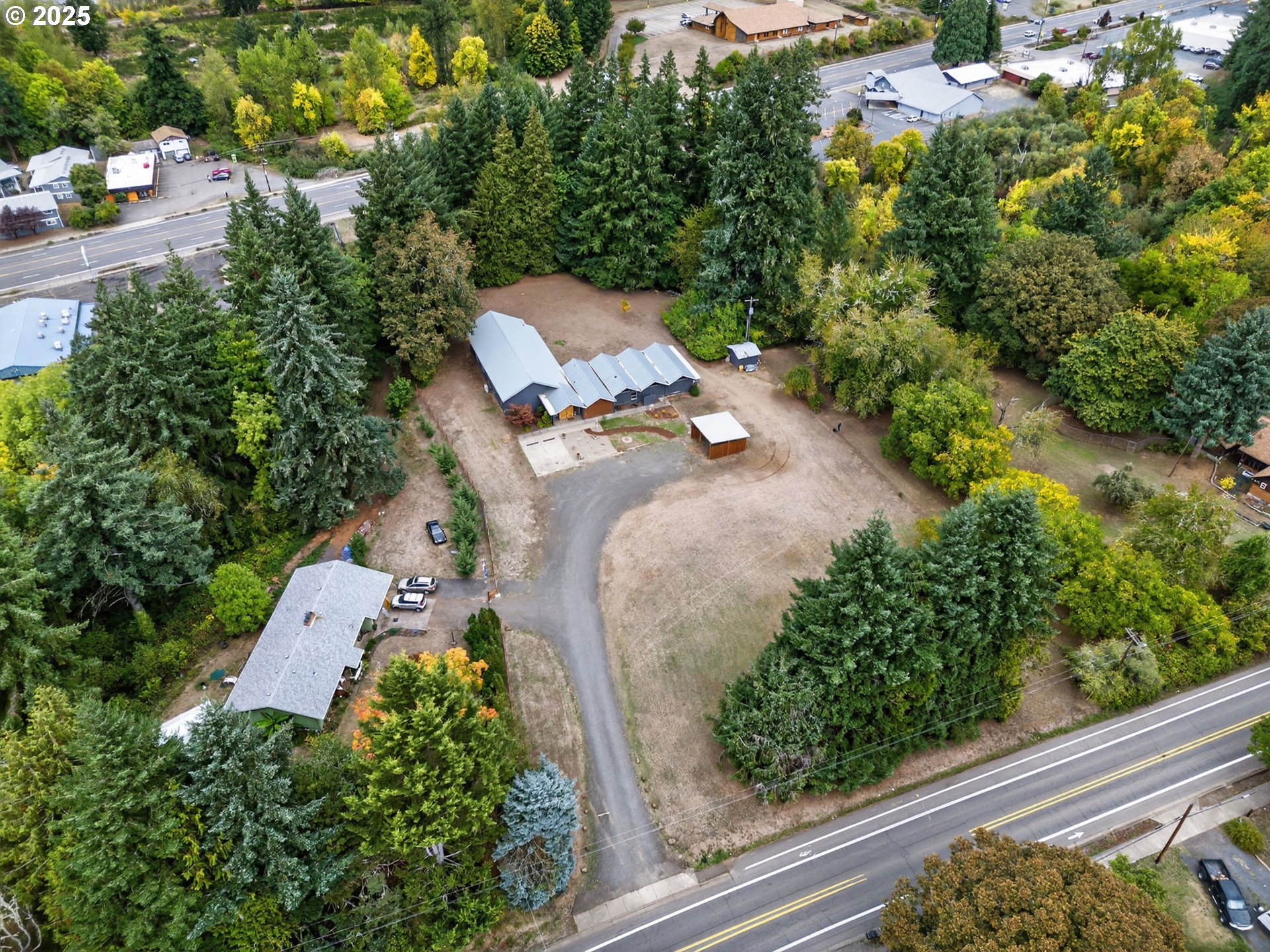 2590 Long Street Sweet Home, OR 97386 - Photo 9 of 48 an aerial view of a house with a yard basket ball court and outdoor seating