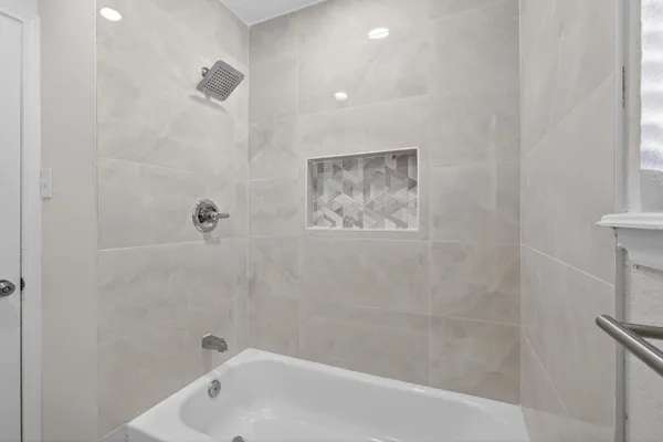 a bathroom with a bathtub