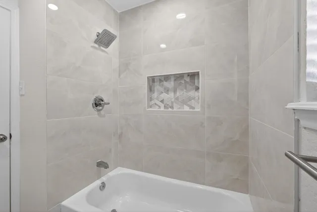 a bathroom with a bathtub