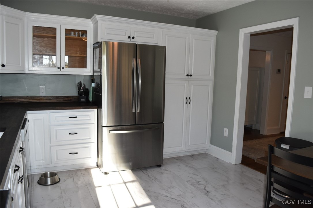 1118 West Osborn Road Farmville, VA 23901 - Photo 11 of 38 Kitchen featuring stainless steel fridge, white ca